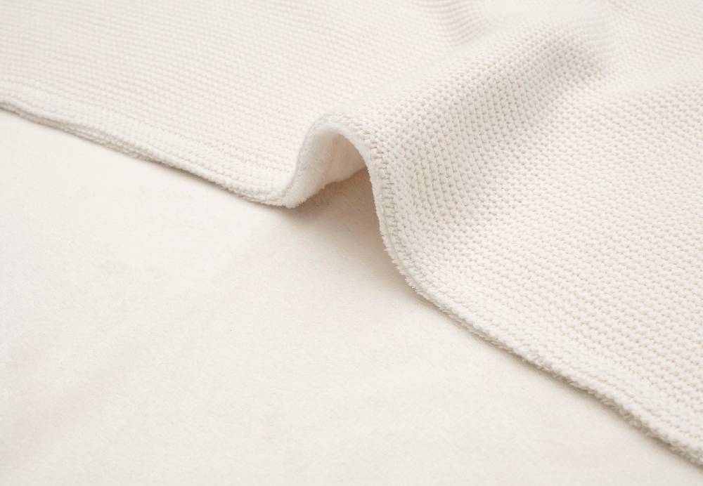 Jollein Decke Kindetbett 100x150cm Basic Knit Ivory/Coral Fleece Top Angebot