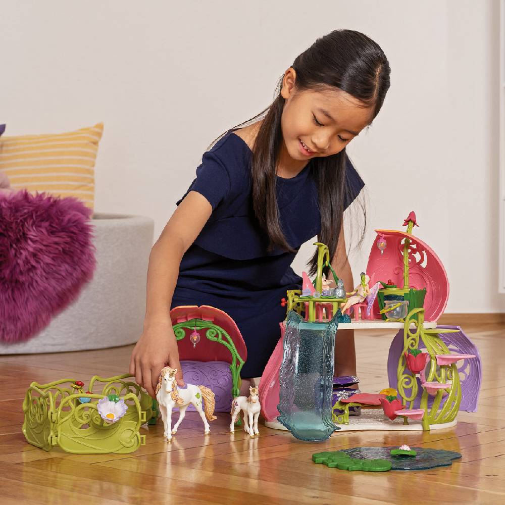Schleich Glitzerndes Blütenhaus mit Einhörnern, See und Stall Wochenangebot